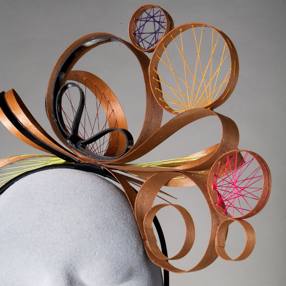 Hat with suspended circles